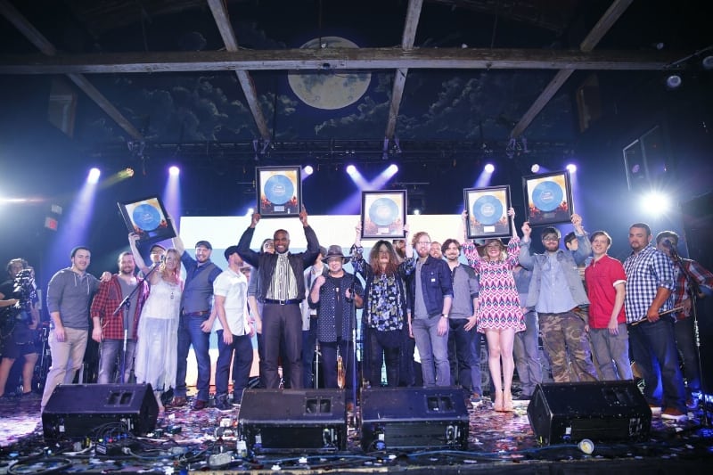 Belk's 2016 Southern Musician Showcase winners celebrate with blue record awards at the competition's finale event. (PRNewsFoto/Belk, Inc.)